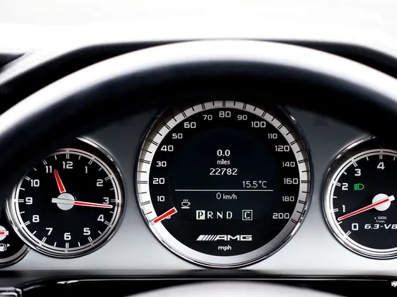Instrument panel of a car showing speedometer and tachometer dials