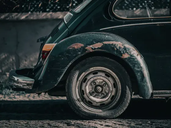 Close view of aged automotive paint on a body panel